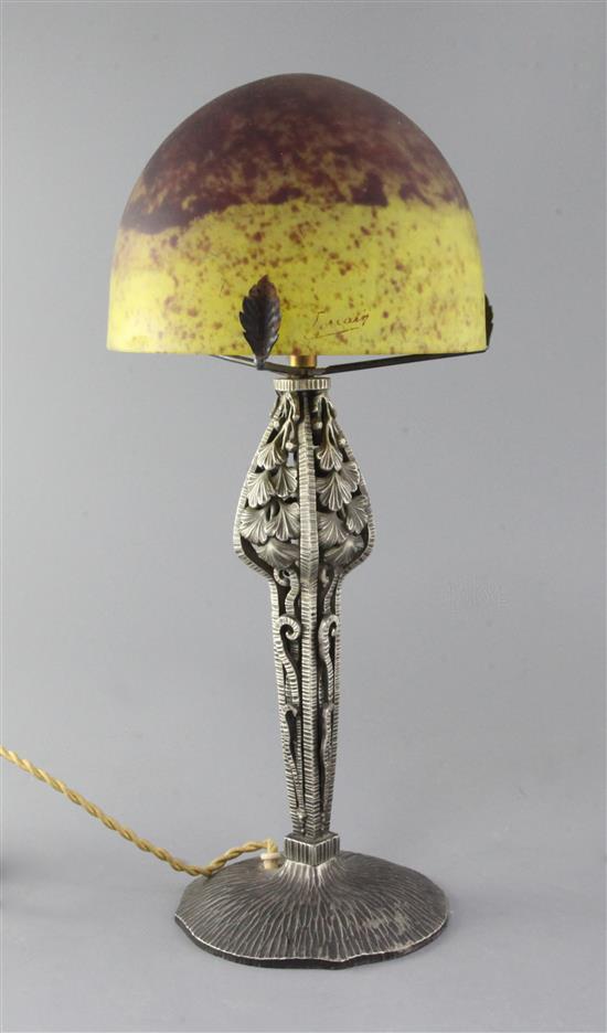 A French Art Deco silvered metal and glass mushroom table lamp, in the manner of Edgar Brandt, height 16in.